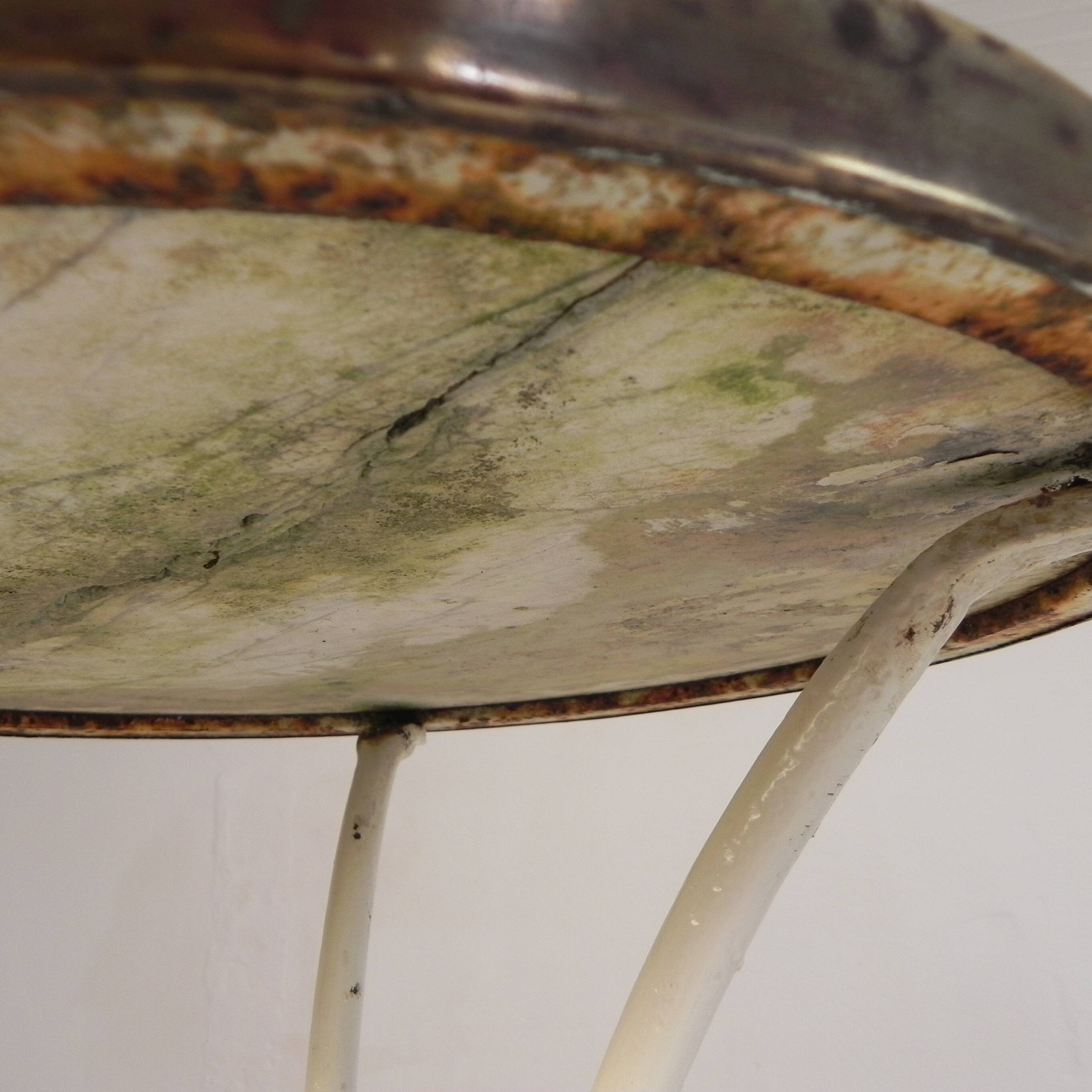 Bistro table with a marble top and brass edging, early 20th century.