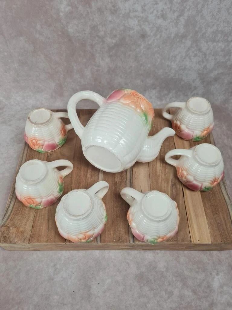 Adorable little vintage tea set in coloured earthenware.