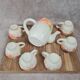 Adorable little vintage tea set in coloured earthenware.