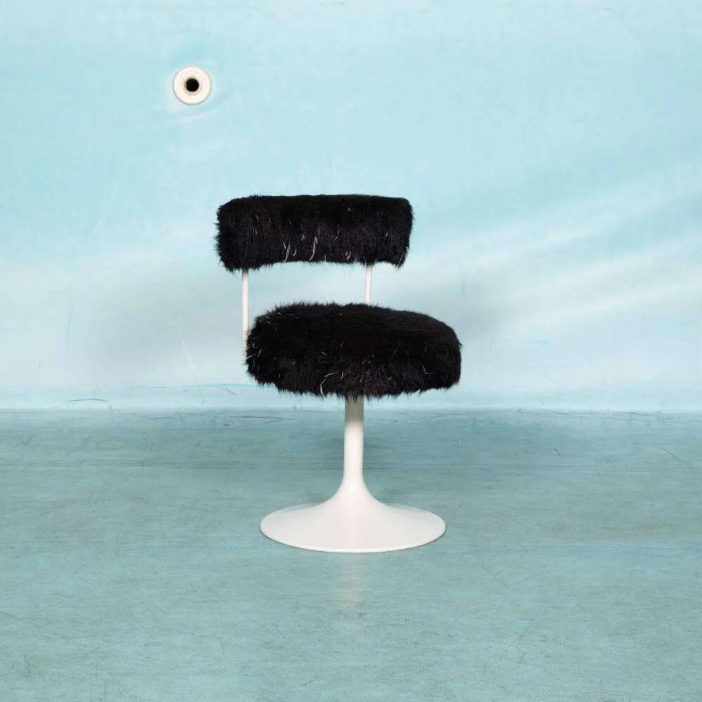 Space age design armchair from the sixties, fluffy stool with trumpet base.
