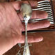 Series of 12 small silver metal spoons