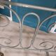 Wrought iron children's bed from the late 19th century.