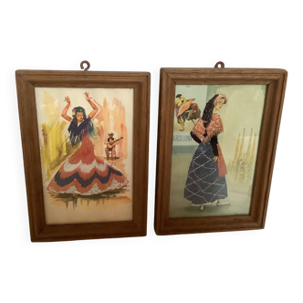 Pair of small frames with Spanish illustrations