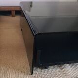 Curved glass coffee table