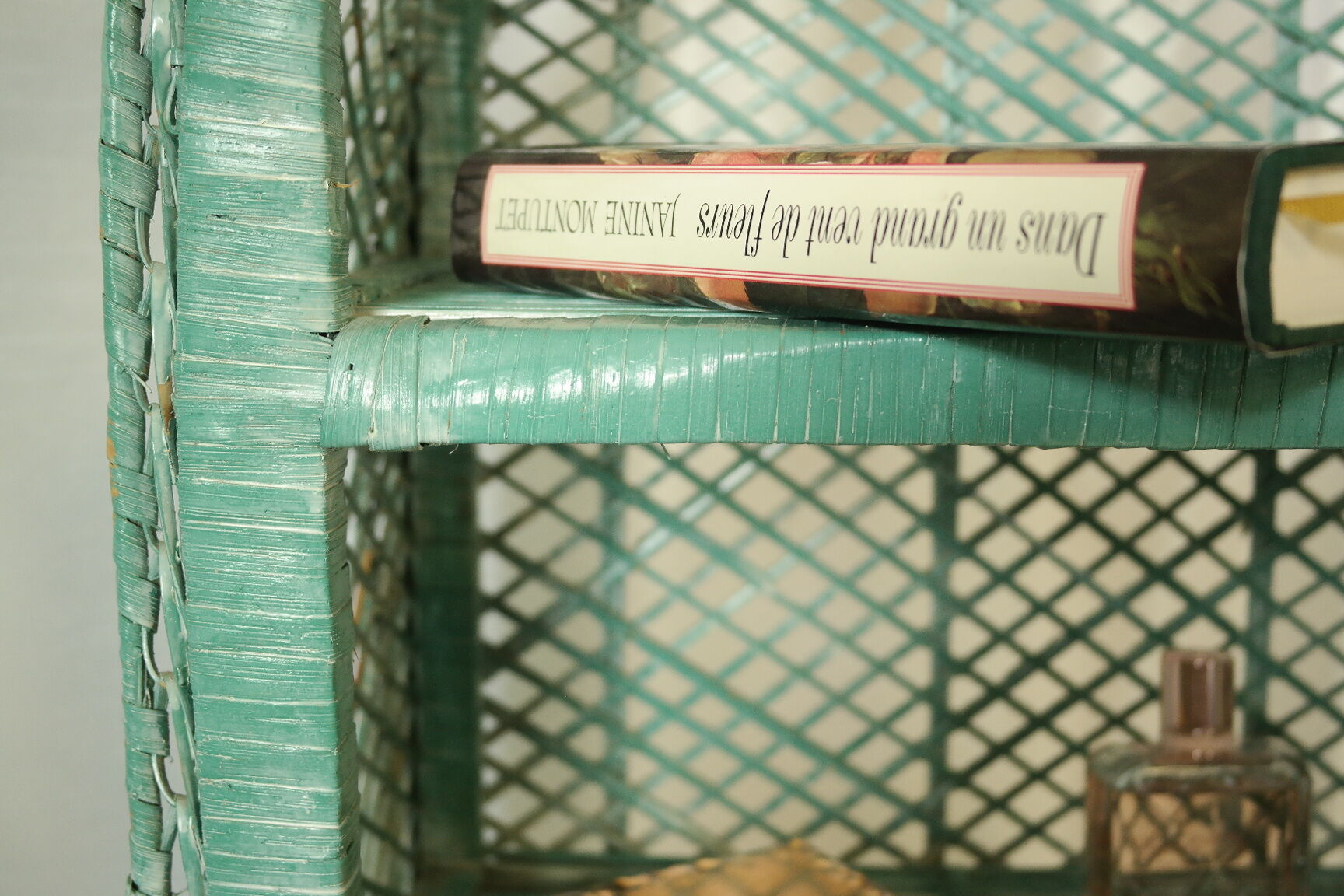Vintage mint green wicker bookcase