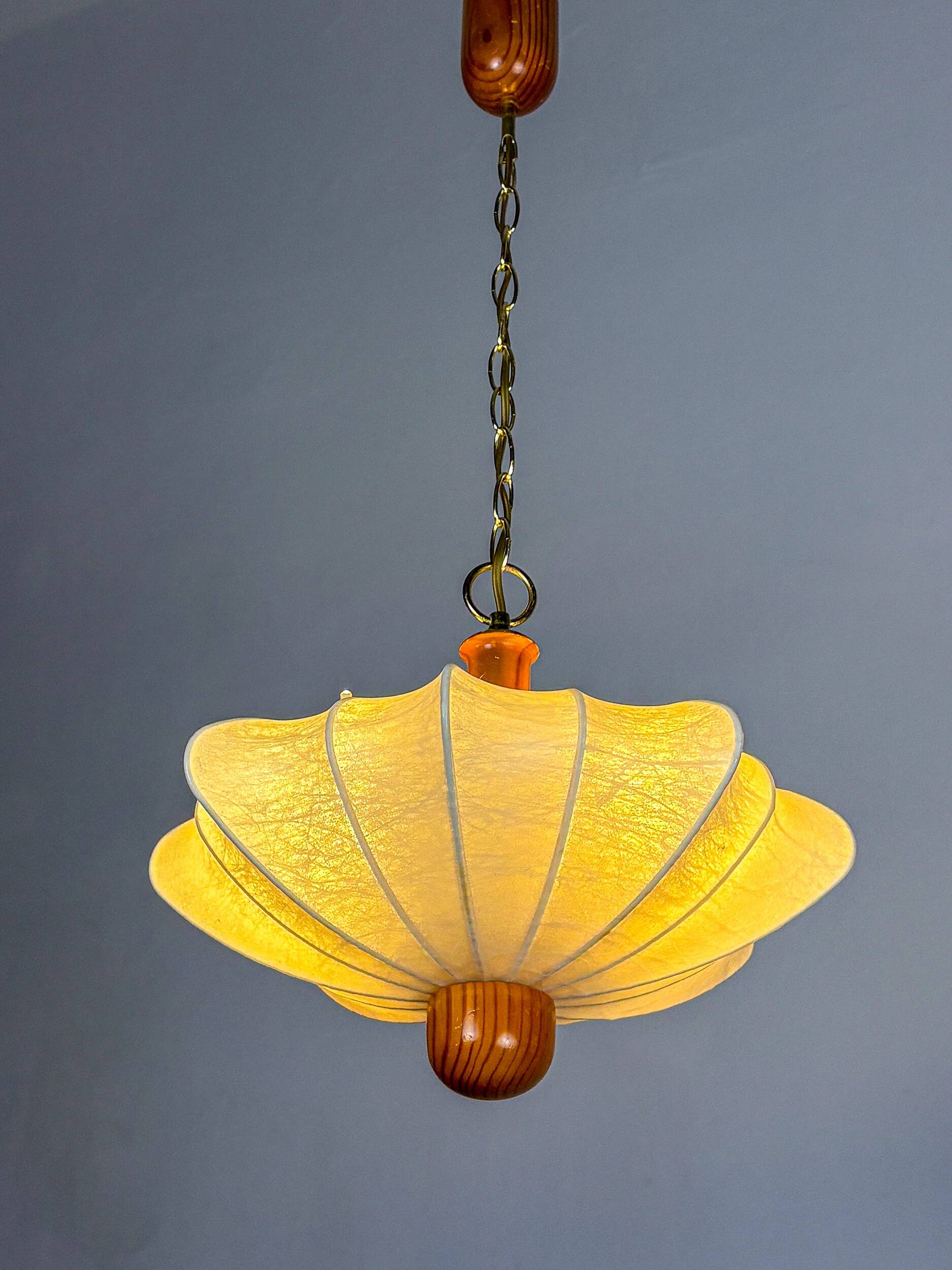 1960s Italian cocoon suspension, made of resin and pine wood.