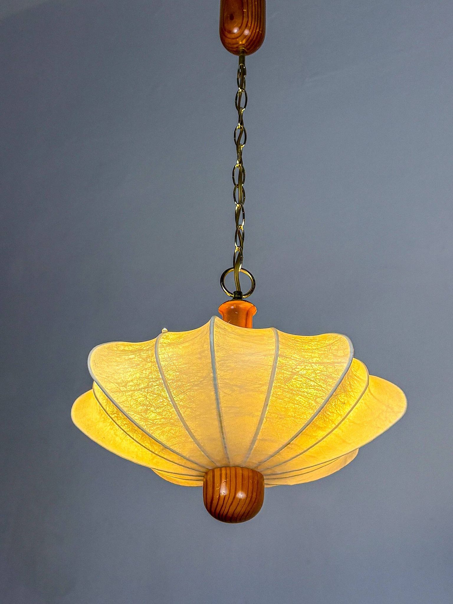 1960s Italian cocoon suspension, made of resin and pine wood.