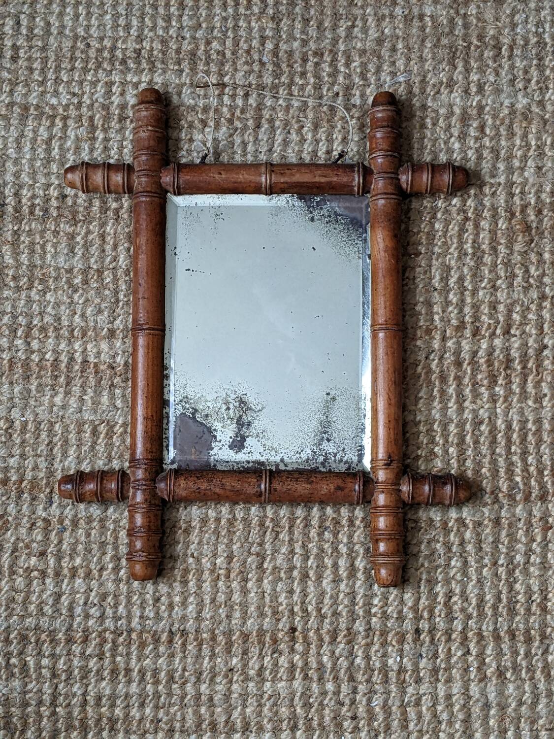 Wooden mirror in bamboo style, 1950s country decor.