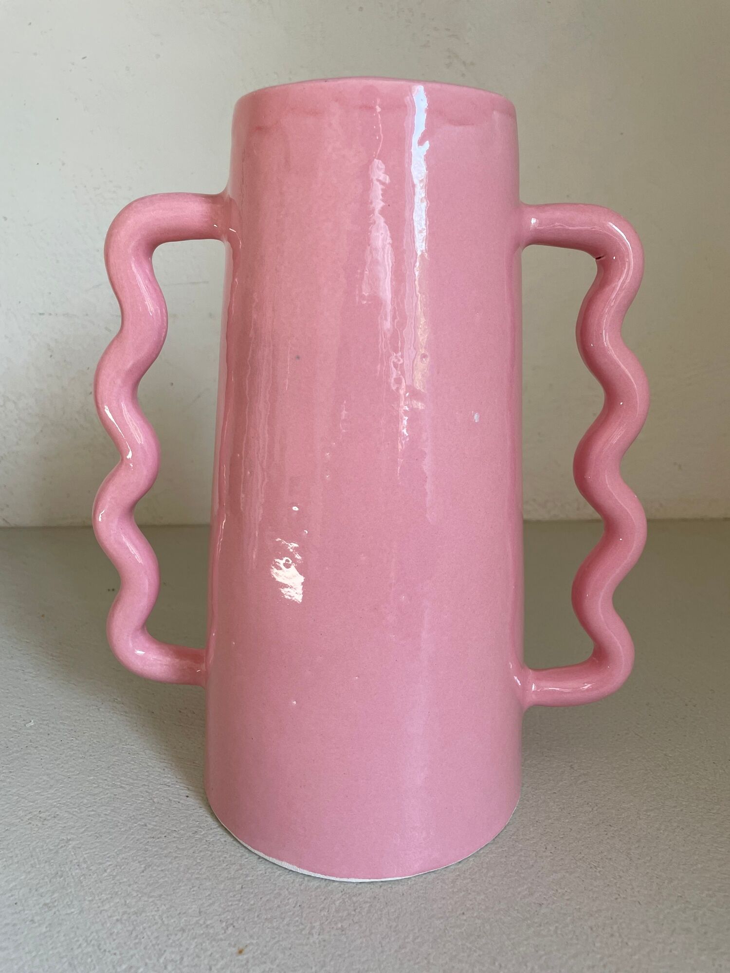 Handmade abstract corrugated handle pink ceramic vase