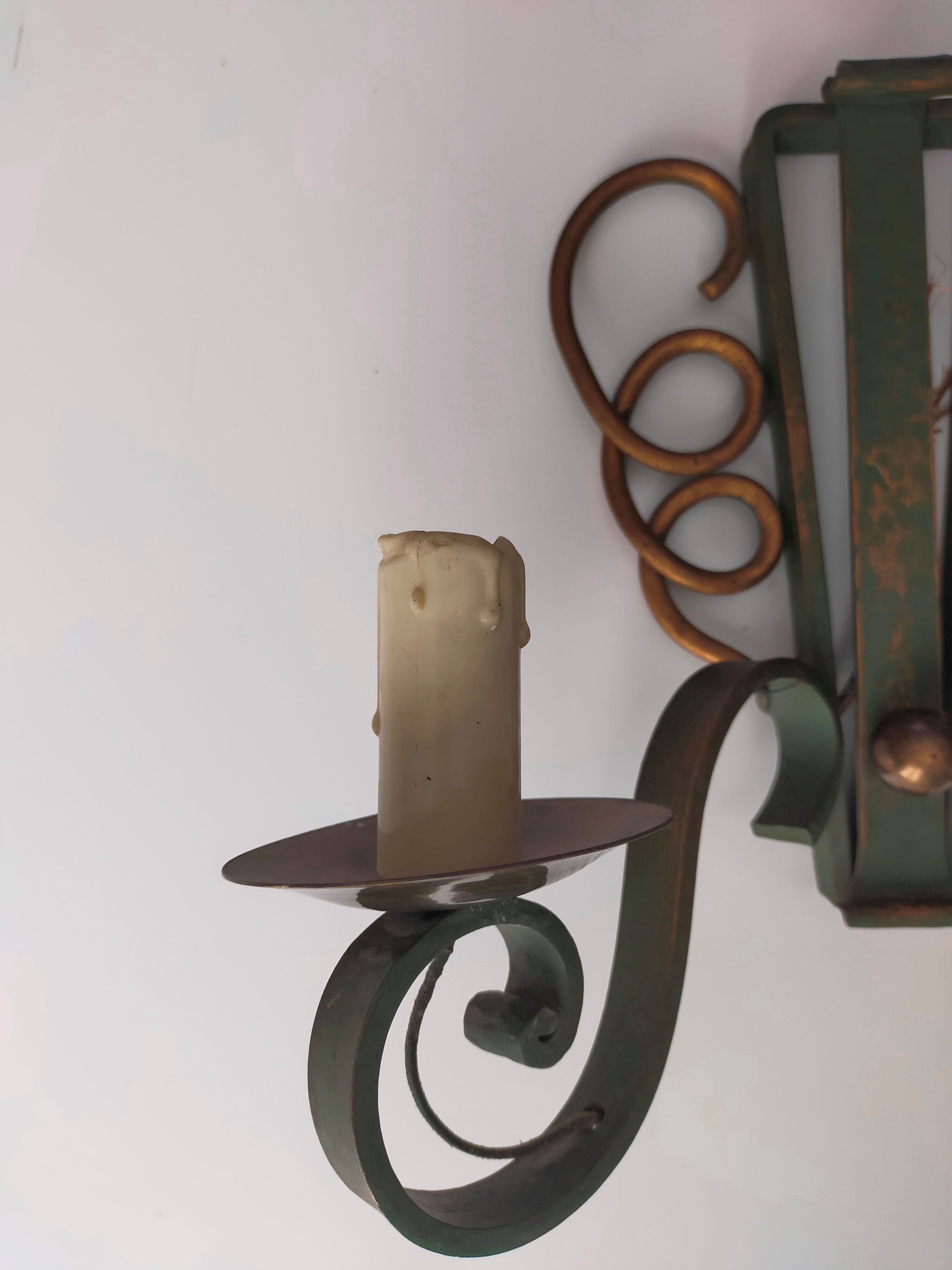 Pairs of vintage wrought iron wall lamps