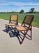 Set of 2 folding chairs in wood and cane.