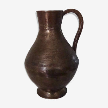 Skidded copper pitcher