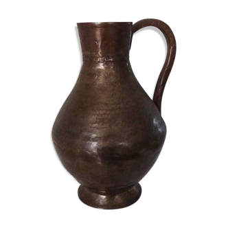 Skidded copper pitcher