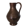 Skidded copper pitcher