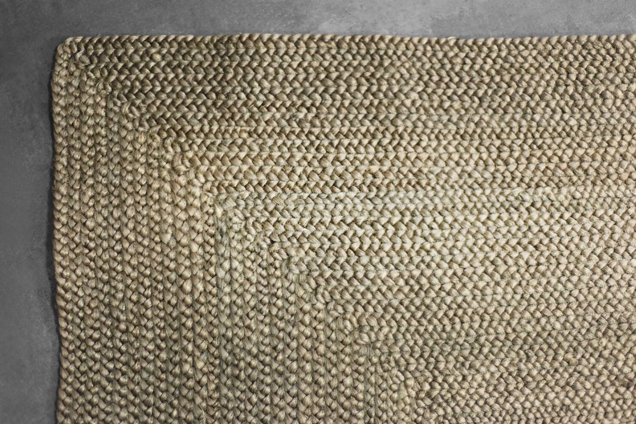 Brown flat-woven jute Indian rug, 1970.