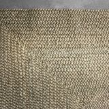 Brown flat-woven jute Indian rug, 1970.