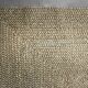 Brown flat-woven jute Indian rug, 1970.