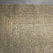 Brown flat-woven jute Indian rug, 1970.