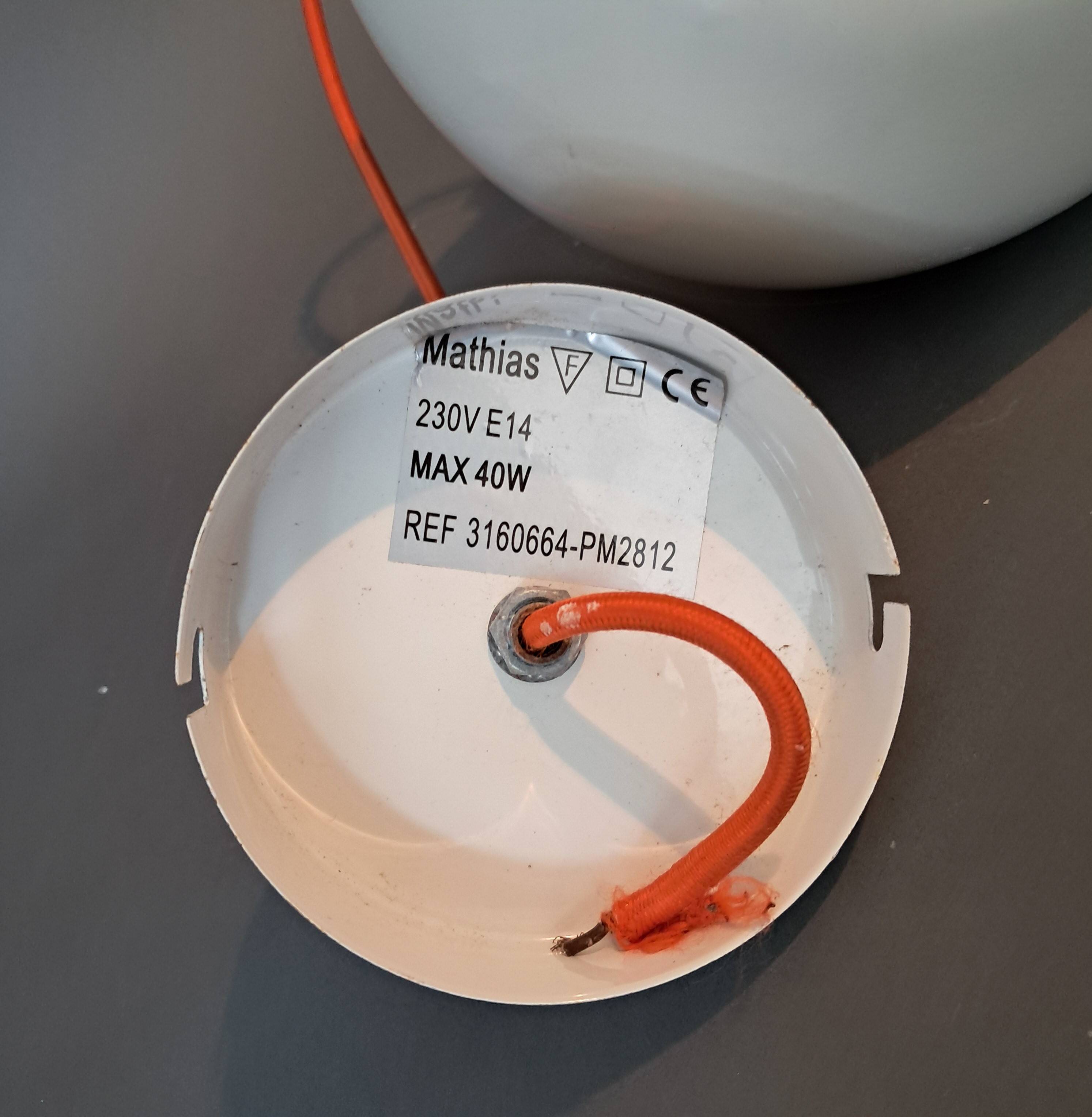 White openwork pendant light with orange interior 1970/1980.