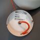 White openwork pendant light with orange interior 1970/1980.