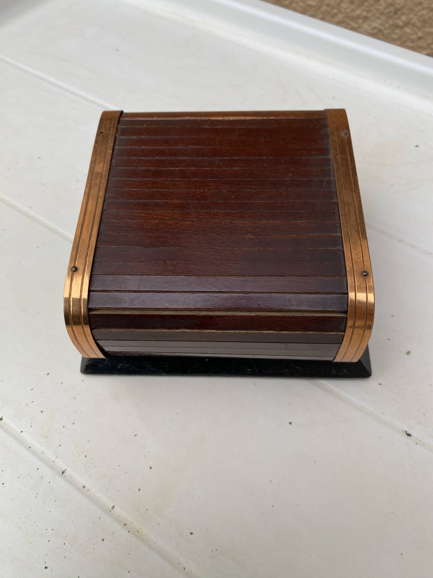 Art Deco wooden and brass cigarette box with curtain + glass ashtray