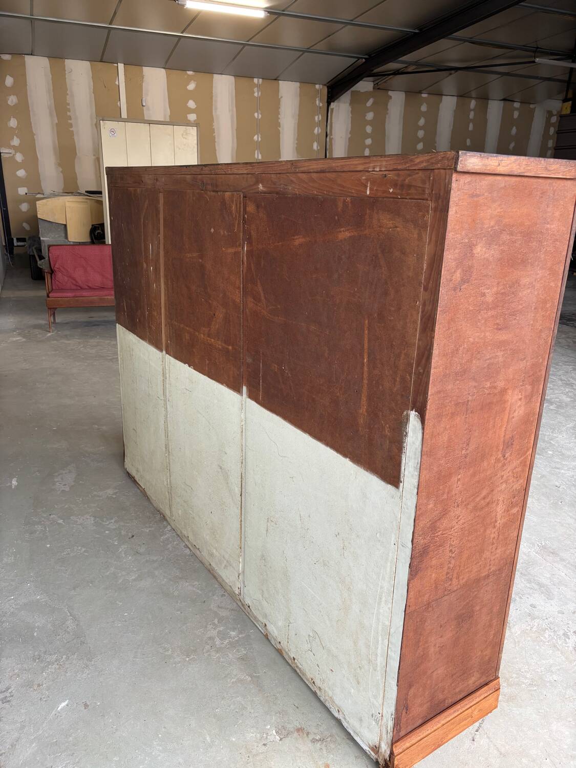 Large wooden workshop cabinet with 16 drawers, antique from the early 1900s.