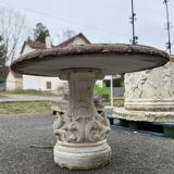 Pretty round table in reconstituted stone