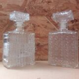 Pair of molded glass whiskey liqueur carafes + vintage stoppers