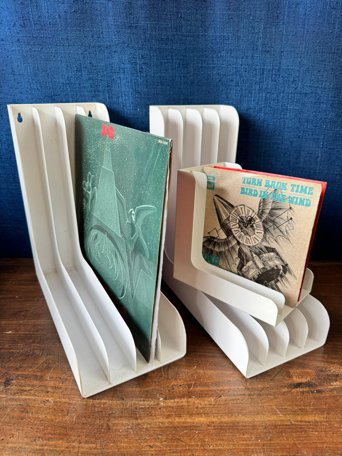 Set of 6 boomerang-shaped vinyl record racks/storage units. 1970s/80s.