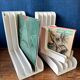 Set of 6 boomerang-shaped vinyl record racks/storage units. 1970s/80s.