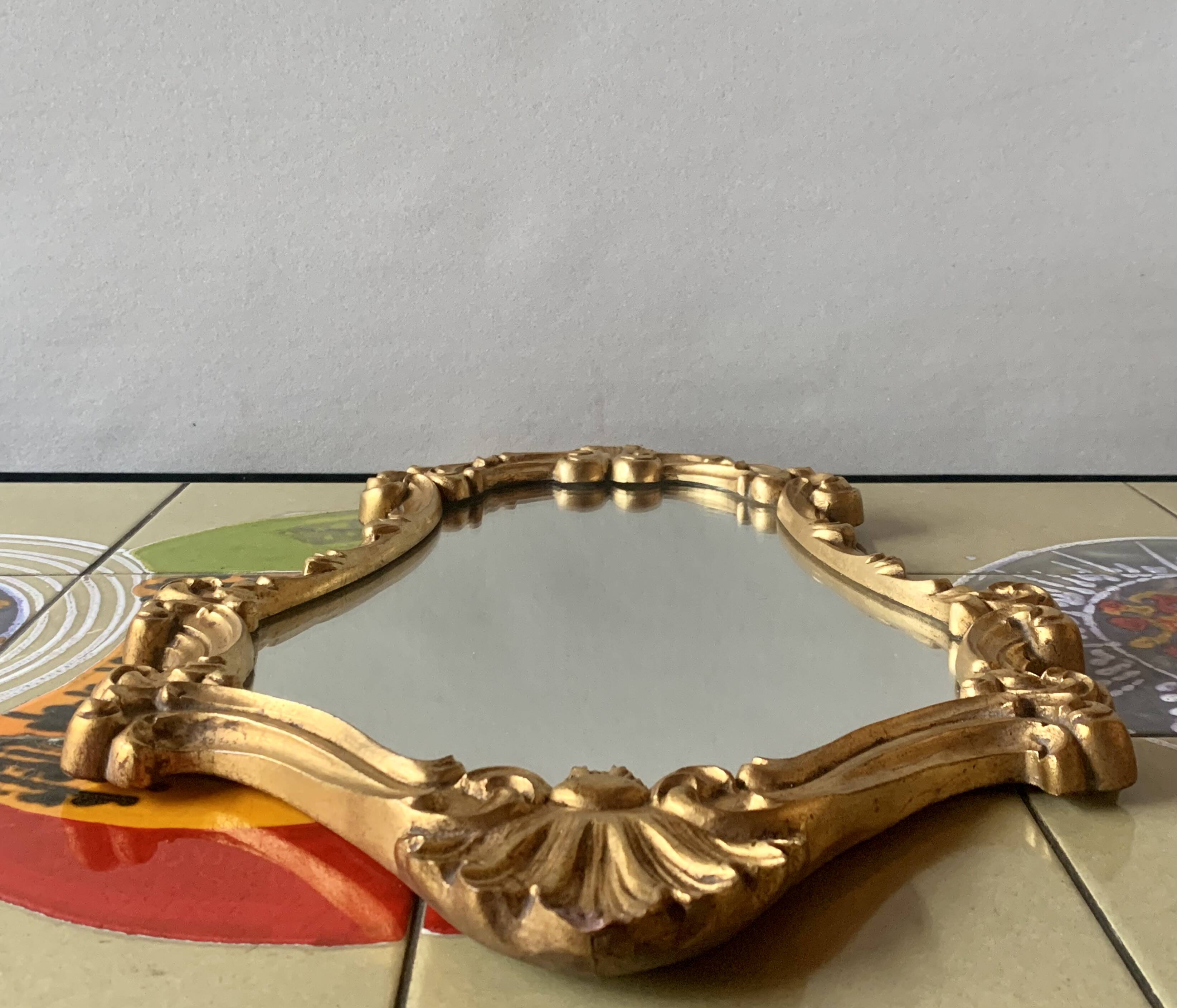 Vintage wall mirror in gold plaster - rococo style