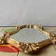 Vintage wall mirror in gold plaster - rococo style