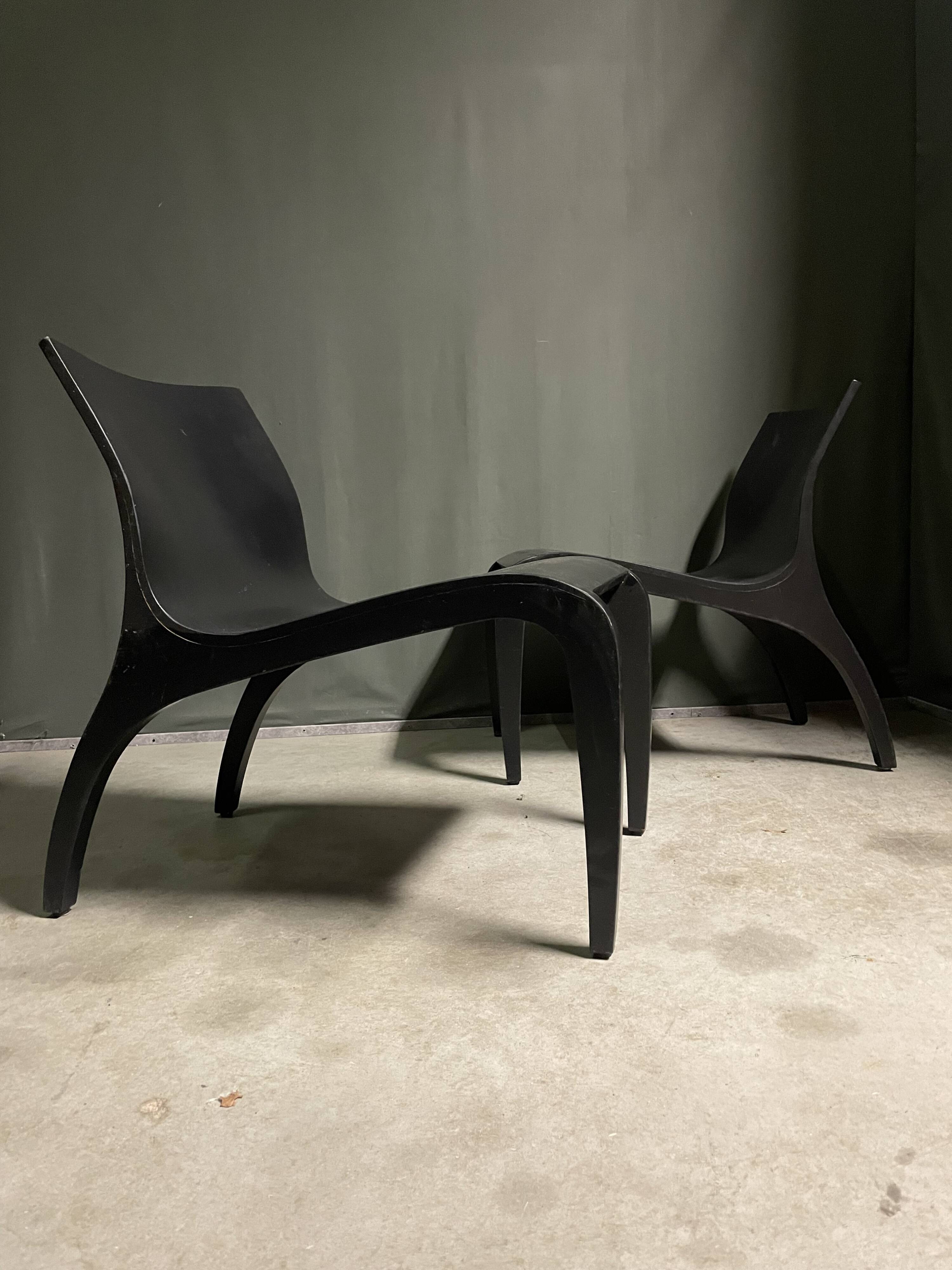 A pair Minimalist bent plywood lounge chairs