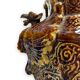 Important Longchamp Griffon vase in golden ceramic