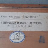 Wooden box containing 30 antique thimbles