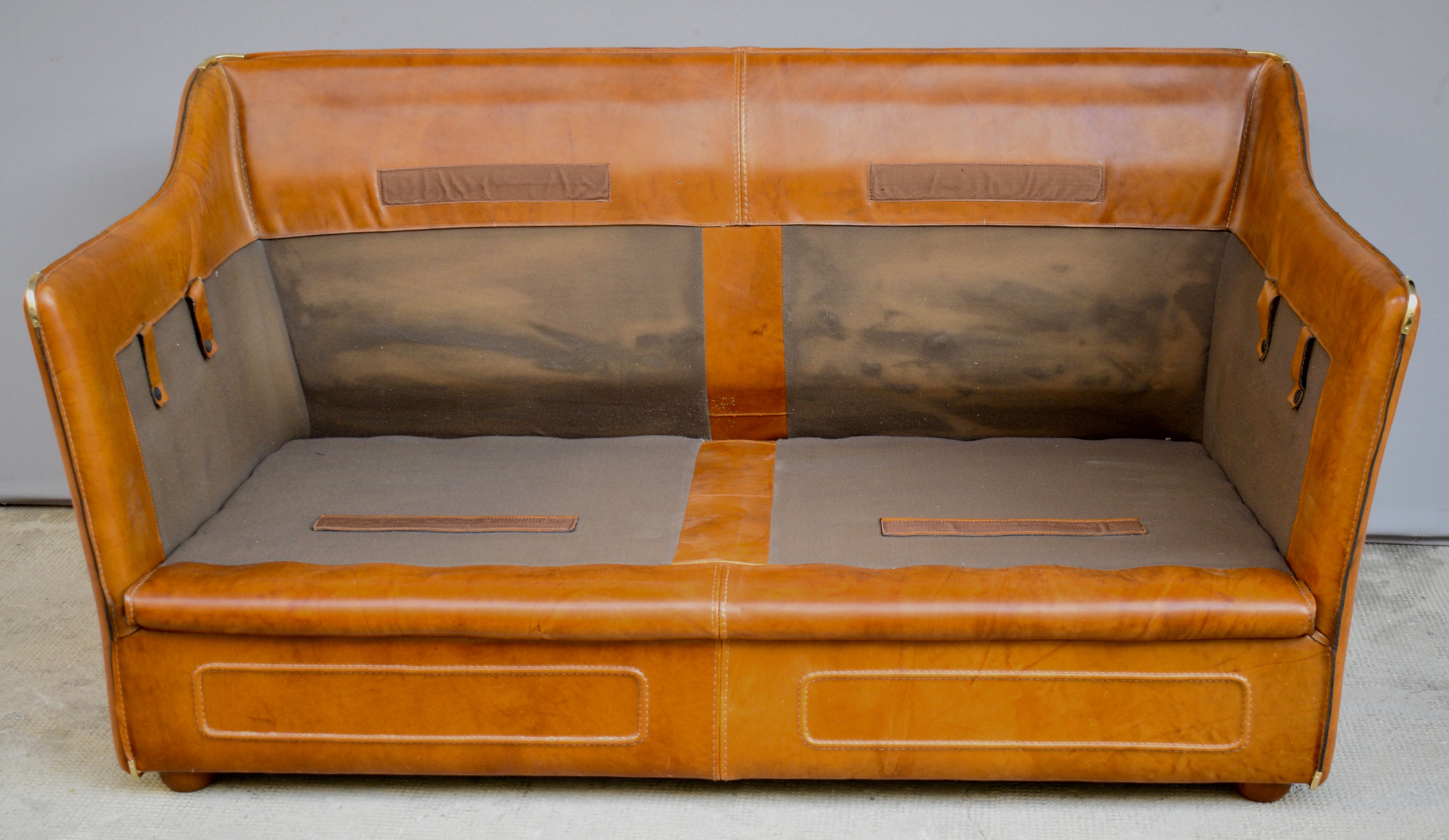 Vintage two-seater leather sofa