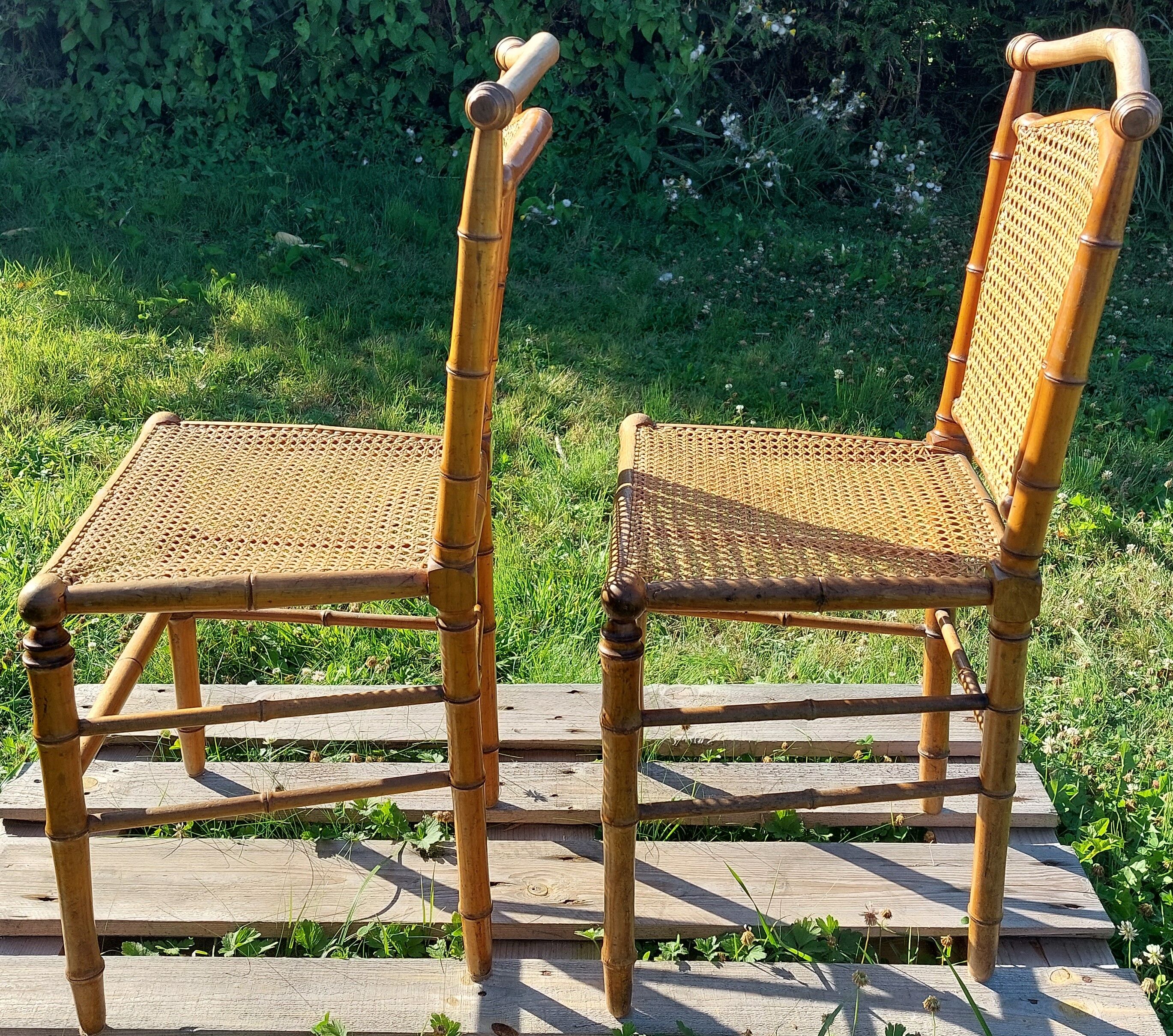 Duo of wooden chairs turned bamboo style