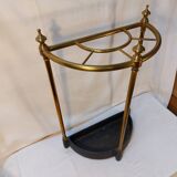 Victorian style half-moon umbrella stand in brass and cast iron