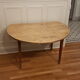 Round table with flaps