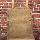 Mirror with moldings on the frame