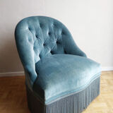 Armchair in blue velvet
