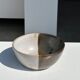 White and glossy brown two-tone ceramic bowl, matt earth