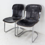 Pair of windmill leather chairs