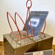 Vintage orange metal magazine rack, 1970s