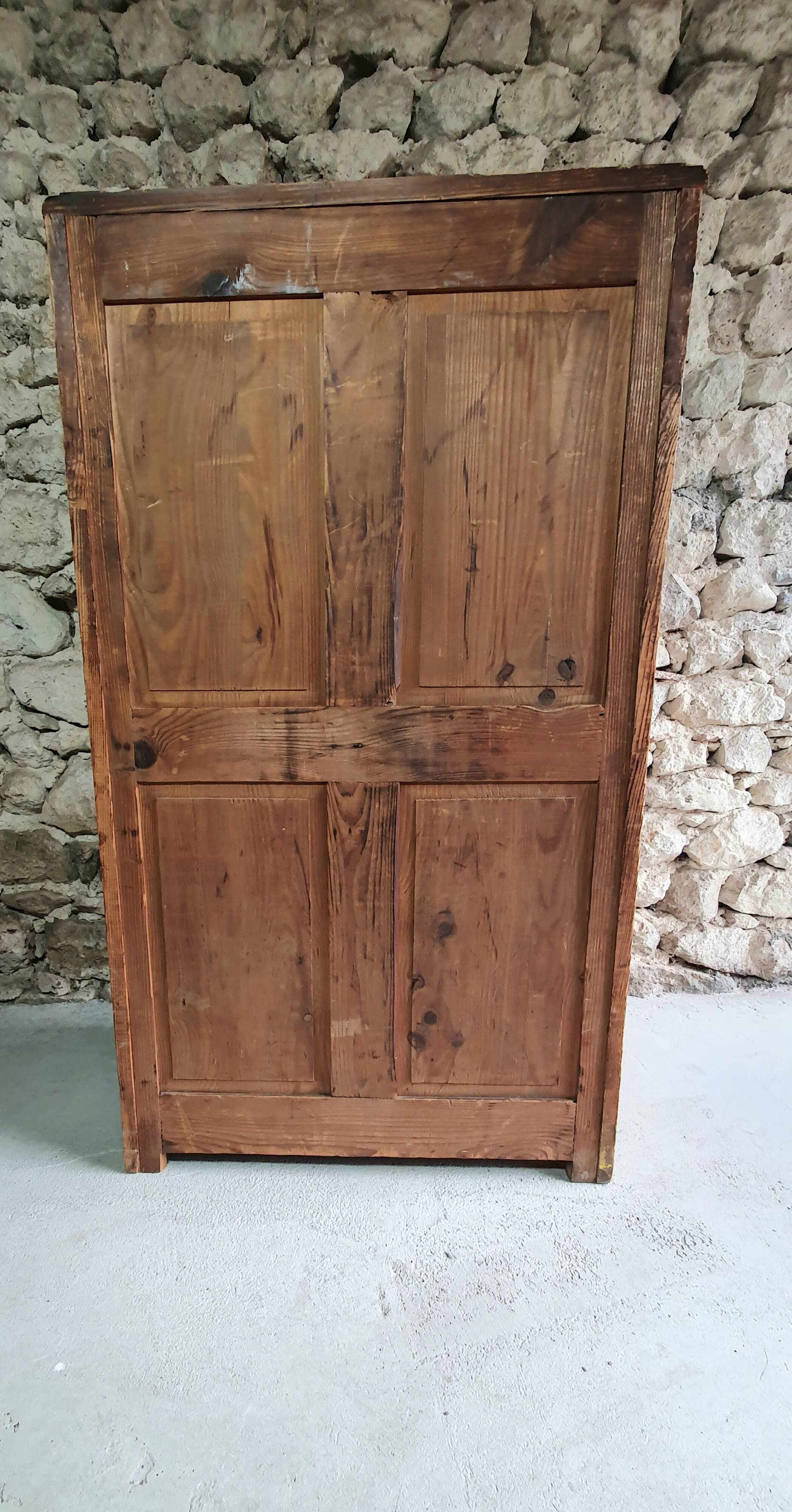 Small cabinet made of raw wood