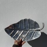 Silver metal leaf pocket emptier