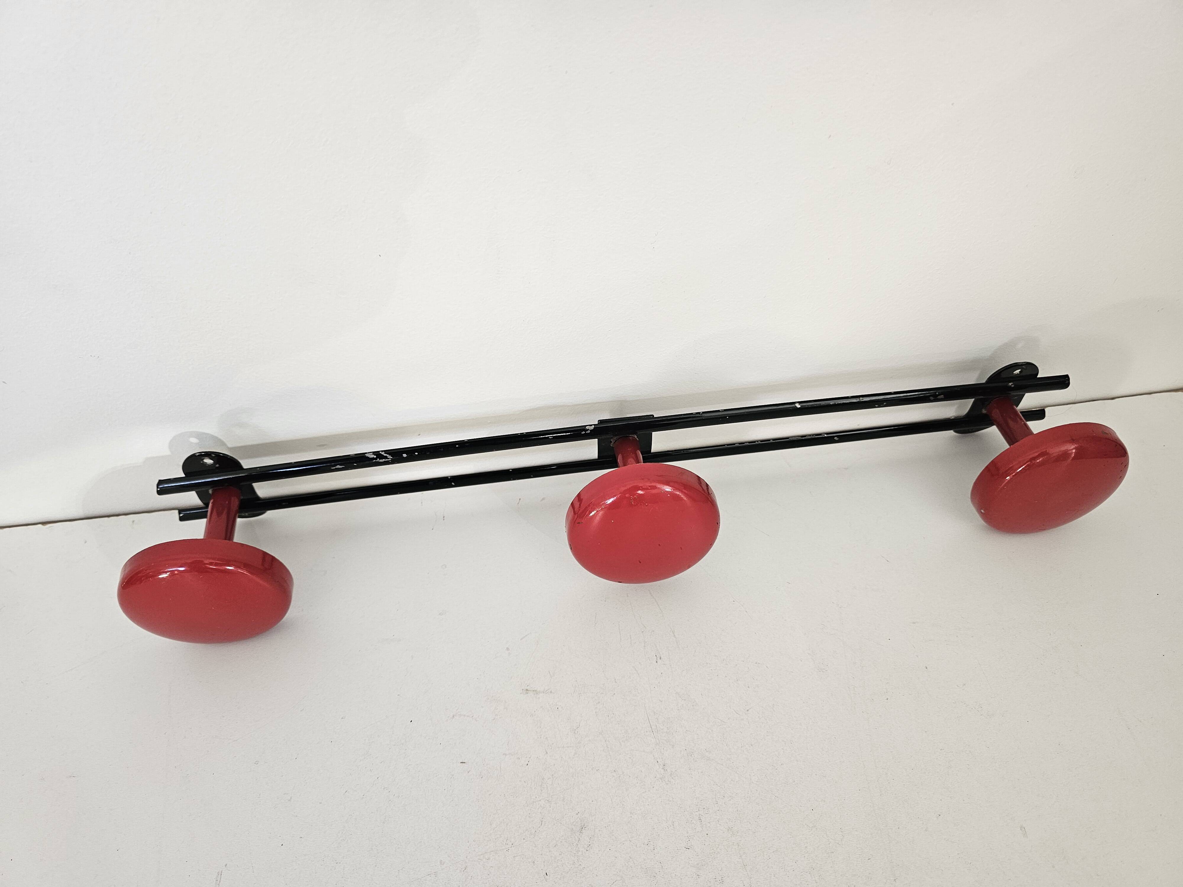 Vintage black and red coat rack with 3 hooks from the 1960s.