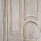 patinated wooden headboard