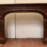 Pair of Louis XIV style fireplaces in red cherry marble. XIX century.