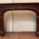Pair of Louis XIV style fireplaces in red cherry marble. XIX century.